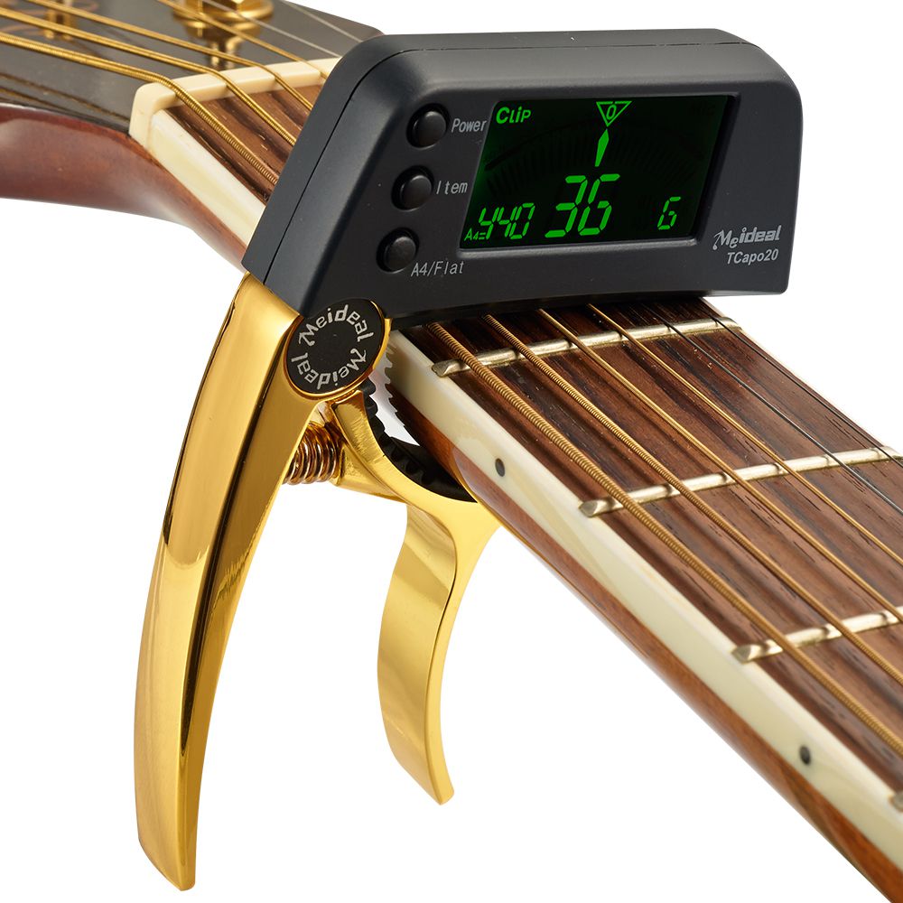 Afinador de guitarra y cejilla 2 en 1